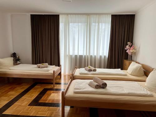 Postel nebo postele na pokoji v ubytování Pension Francesco