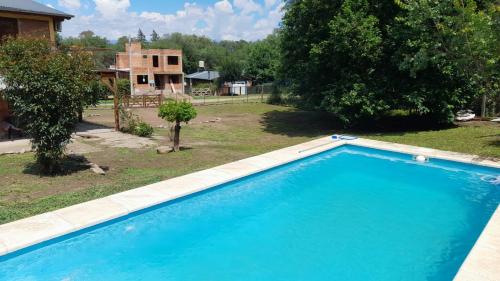 Bazén v ubytování POSADA LAS MARGARITAS nebo v jeho okolí