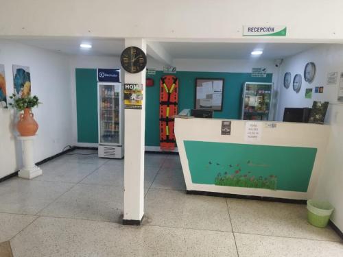 Лобби или стойка регистрации в Hotel Cartago Plaza