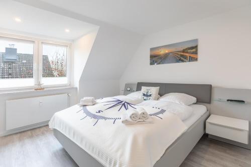 Giường trong phòng chung tại Ferienhaus Bellaeins