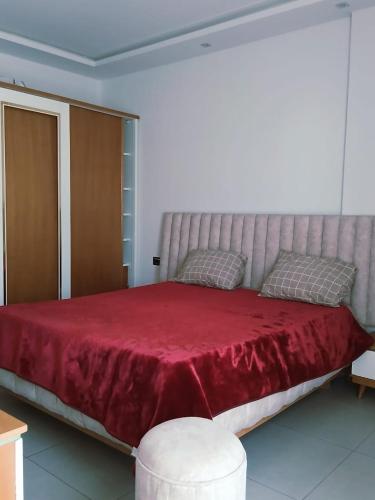 Ένα ή περισσότερα κρεβάτια σε δωμάτιο στο Appartement Prestige