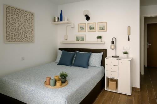 Ένα ή περισσότερα κρεβάτια σε δωμάτιο στο Columbus Playa