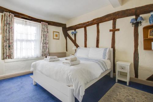 Voodi või voodid majutusasutuse Clematis Cottage toas