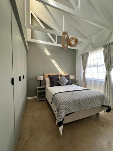 Postel nebo postele na pokoji v ubytování Lilly Bloom