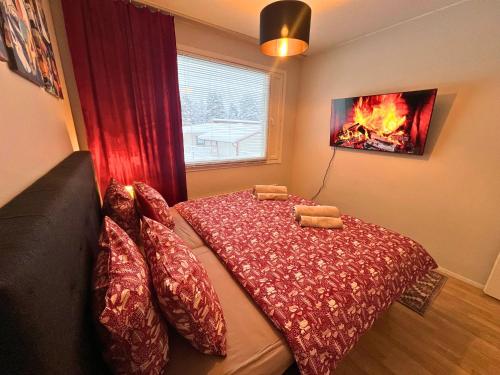 Ένα ή περισσότερα κρεβάτια σε δωμάτιο στο Arctic Warm Home