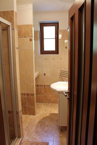 Kúpeľňa v ubytovaní Apartmány Olympia