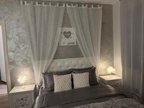 Giường trong phòng chung tại La Suite nella Valle