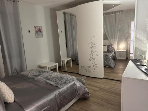 Giường trong phòng chung tại La Suite nella Valle