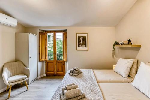 Giường trong phòng chung tại Casa Gall