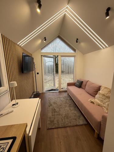 Televiisor ja/või meelelahutuskeskus majutusasutuses Tiny House im Schwarzwald-Natur, Ruhe & Erholung