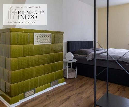 Ένα ή περισσότερα κρεβάτια σε δωμάτιο στο Ferienhaus Enessa