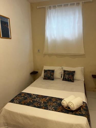 Postel nebo postele na pokoji v ubytování Vilare Pousada