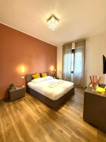 Giường trong phòng chung tại Linate Lounge Apartment