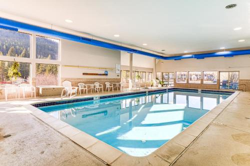 a large swimming pool in a large house with a swimming poolvisor at 1 Mi to Keystone Resort Mtn-View Family Escape! in Keystone