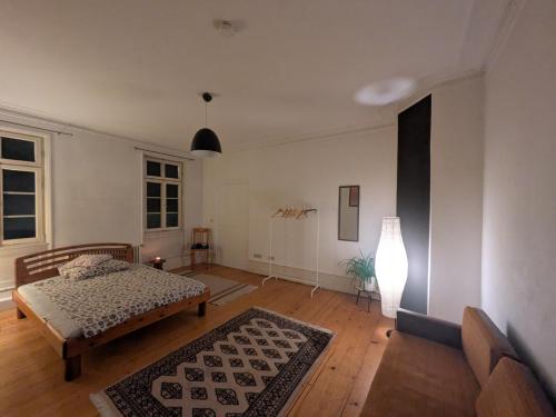 Postel nebo postele na pokoji v ubytování Einzelzimmer mit Altbau Charme