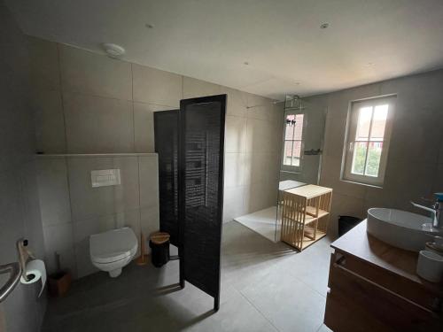 Koupelna v ubytování La cour du vigneron