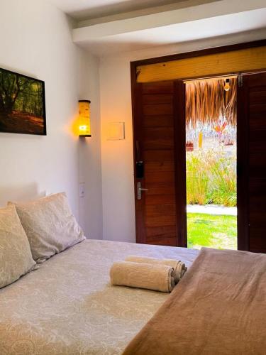 Postel nebo postele na pokoji v ubytování Suite Individual com AR e WI-FI Casa Full Hausi