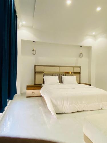 Postel nebo postele na pokoji v ubytování Villa adventureskribi