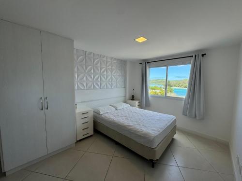 Ένα ή περισσότερα κρεβάτια σε δωμάτιο στο PACIFIC - PRAIA DO FORTE