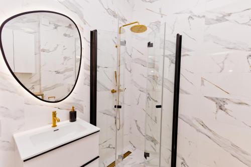 Koupelna v ubytování Hevenia Mrzeżyno 8