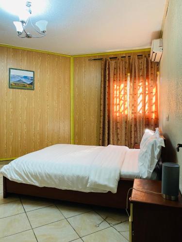 Llit o llits en una habitació de Welcome 3