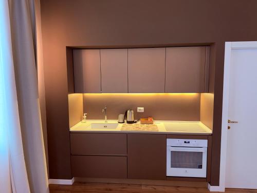 Køkken eller tekøkken på Domus Carignano Luxury Apartment