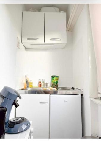 Η κουζίνα ή μικρή κουζίνα στο Studio des Trois Frontières