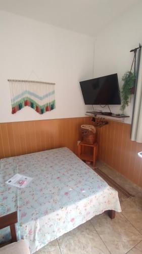 Postel nebo postele na pokoji v ubytování Suíte Nosso Mar Doce Lar em Conceição de Jacareí