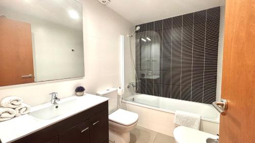 Et badeværelse på Luminoso apartamento by Prestigi