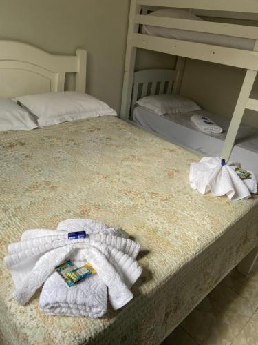 En eller flere senge i et værelse på Cantinho da Paz 2