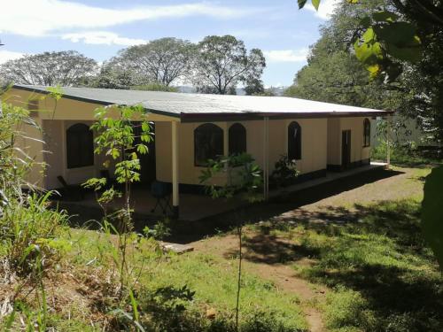 a house in the middle of a field at Aura Living in La Garita