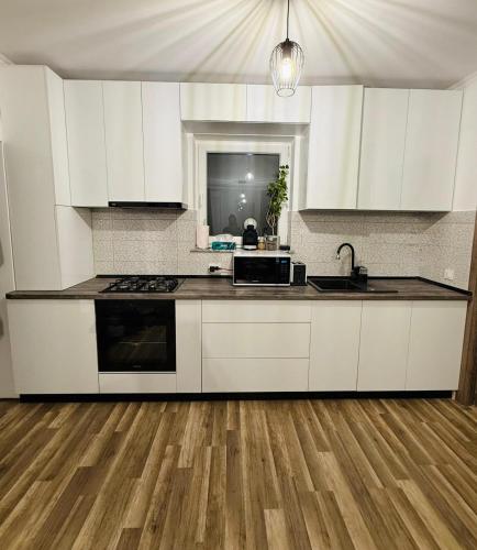 Kuchyň nebo kuchyňský kout v ubytování Gabone residence