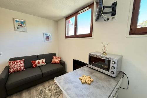 Un lugar para sentarse en Apartment for 4 people near the slopes