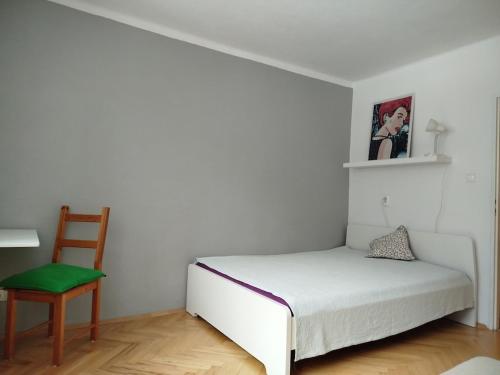 Ένα ή περισσότερα κρεβάτια σε δωμάτιο στο Harmónia 2