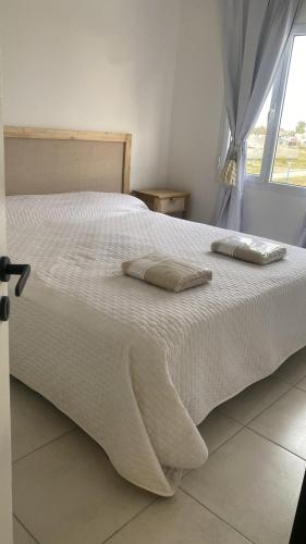 Ένα ή περισσότερα κρεβάτια σε δωμάτιο στο Caetano