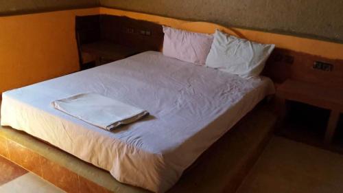 Ένα ή περισσότερα κρεβάτια σε δωμάτιο στο Guest house familly