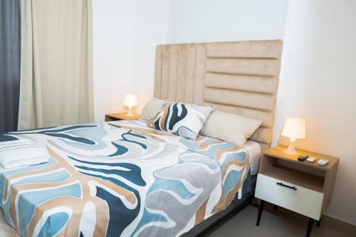 Ένα ή περισσότερα κρεβάτια σε δωμάτιο στο apartamento vacacional apartment via forela 4 BANI