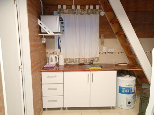 Køkken eller tekøkken på Cuatro Picos Cabañas