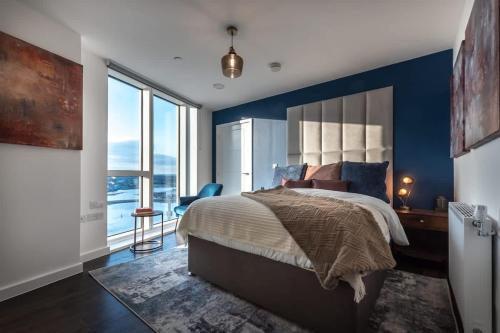 En eller flere senge i et værelse på The Itchen River Penthouse