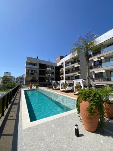 Bazén v ubytování Apto Jacuzzi Pool HomeClub nebo v jeho okolí