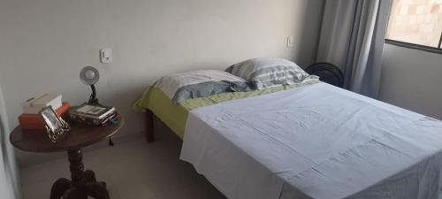 Ein Bett oder Betten in einem Zimmer der Unterkunft Recanto da Dina