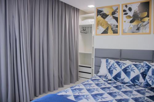 En eller flere senge i et værelse på Portal beira mar (casa)