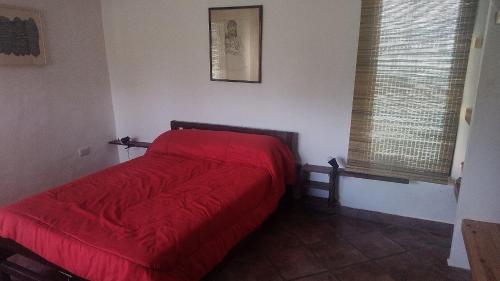 Postel nebo postele na pokoji v ubytování El descanso tiene nombre: Sonko