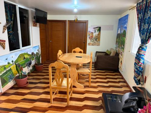 Posezení v ubytování Hotel Maderanegra By Huasicama