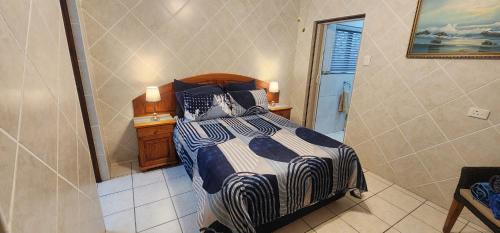 Postel nebo postele na pokoji v ubytování 567 on Strelitzia - Shelly Beach