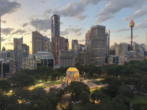 a view of a city skyline with skyscrapers at Accommodation Sydney City Centre - Studio Apartment with Hyde Park View in Sydney