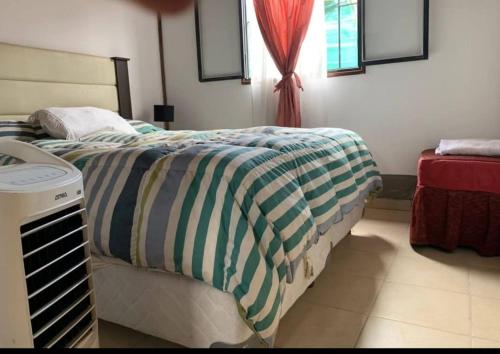 Ένα ή περισσότερα κρεβάτια σε δωμάτιο στο Cabaña la morocha