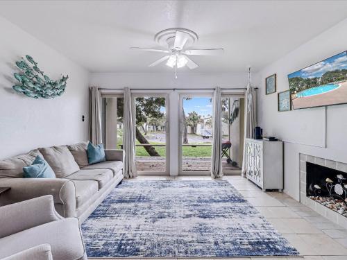 a living room with a couch and a fireplace at Adventure House RRYC17 in Rockport