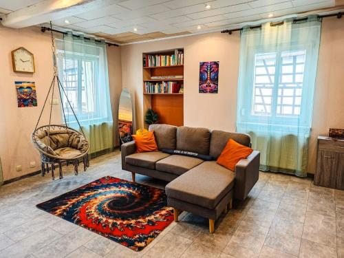 Posezení v ubytování Appartement agréable et atypique, rénové, wifi, terrasse, jardin