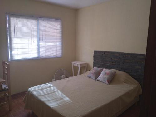 Postel nebo postele na pokoji v ubytování chalet de vacaciones